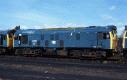 12Apr87. 26013/19 had spent long periods out of use but they were short stays compaired to 25028 seen here. This loco was taken out of traffic unserviceable in Oct 1980! Originally stored at Millerhil until Sep81 it made a move over to Polmadie residing there until Feb83 when it made what should have been its 'final' journey to Glasgow Works for disposal. However Vic came along and bought the machine in Jan87 and it was moved to Thornton that month for scrapping. Change of heart yet again, 25028 made yet another 'final' move, this time it was for good though as after leaving Thornton on 03Jun it arrived in Vic Berry's yard on 09Jun and had disappeared by the 14th. 12Apr87. 26013/19 had spent long periods out of use but they were short stays compaired to 25028 seen here. This loco was taken out of traffic unserviceable in Oct 1980! Originally stored at Millerhil until Sep81 it made a move over to Polmadie residing there until Feb83 when it made what should have been its 'final' journey to Glasgow Works for disposal. However Vic came along and bought the machine in Jan87 and it was moved to Thornton that month for scrapping. Change of heart yet again, 25028 made yet another 'final' move, this time it was for good though as after leaving Thornton on 03Jun it arrived in Vic Berry's yard on 09Jun and had disappeared by the 14th.