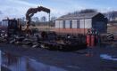 12Apr87. Vic Berry's lorry stands like a vulture over the remains of 27040. 12Apr87. Vic Berry's lorry stands like a vulture over the remains of 27040.